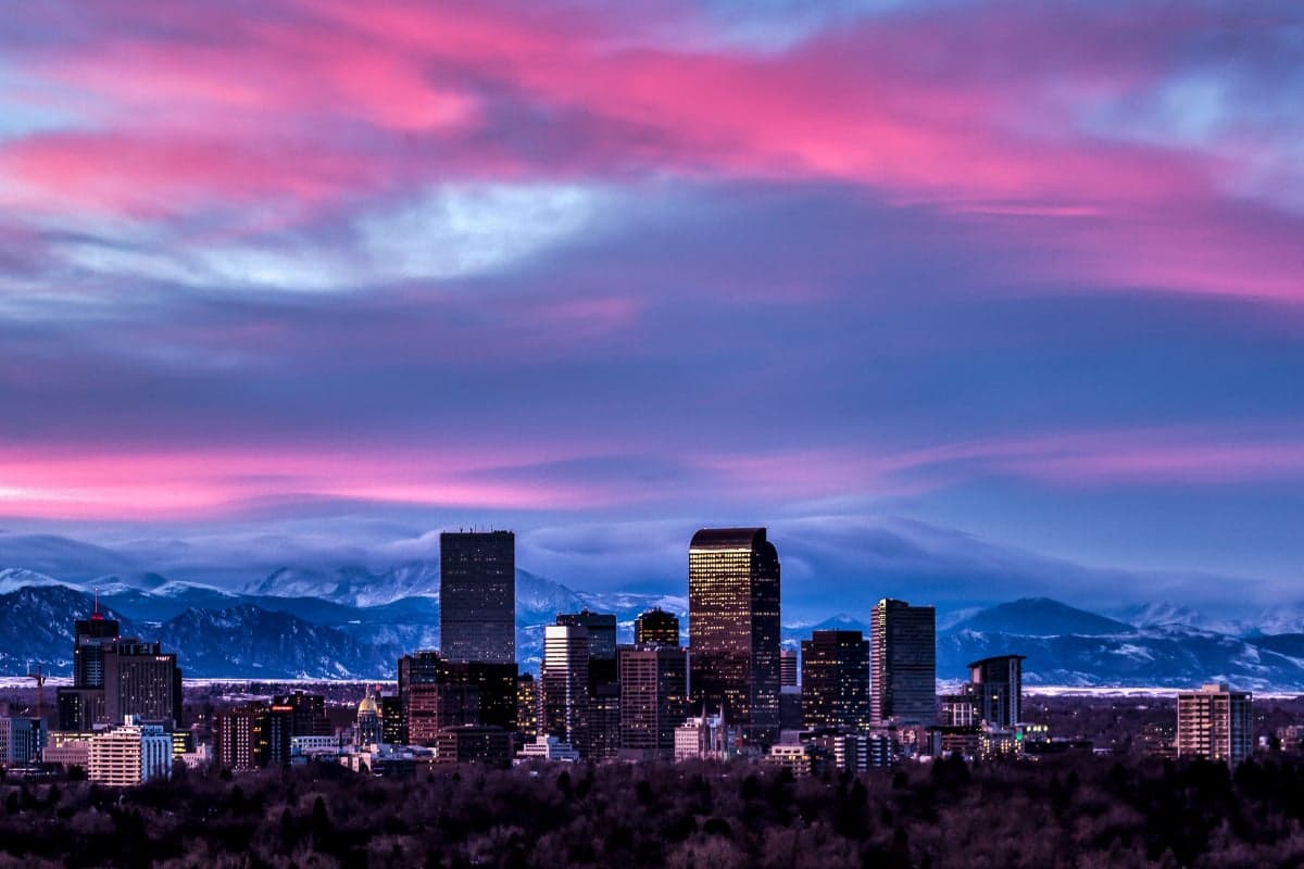 Denver Colorado skyline with Rocky Mountains backdrop