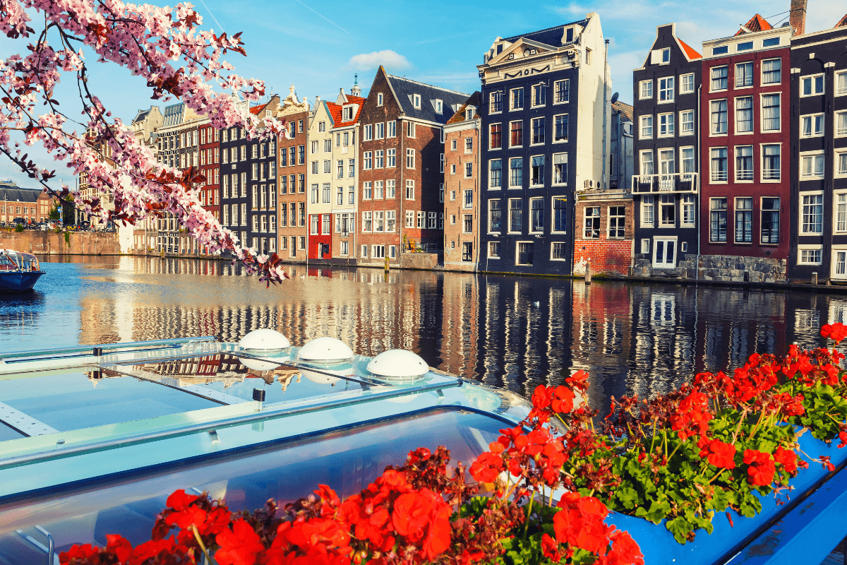 Amsterdam canal houses and boats - travel guide for Dallas DFW travelers