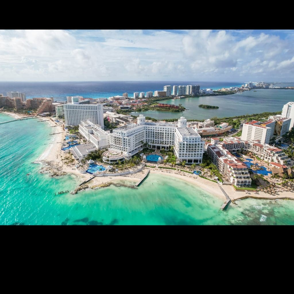 Cancun beach with turquoise Caribbean water and white sand